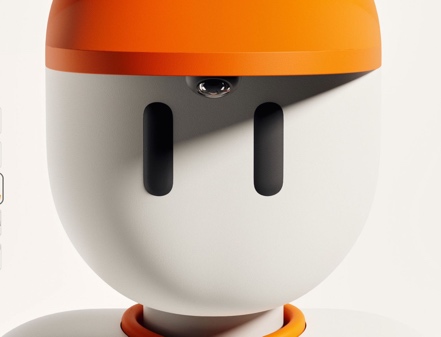 Close-up of the Mamo head with orange cap and camera-slot eyes