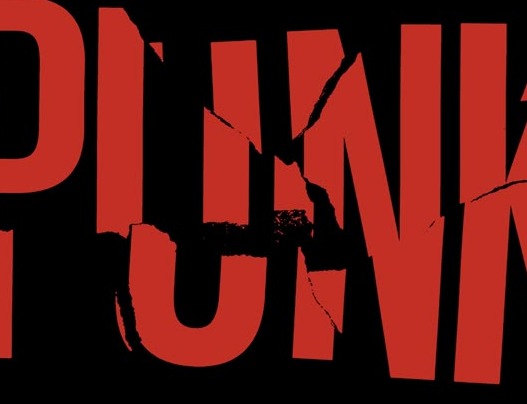 PUNK in torn red paper letters on black