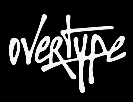 overtype in white marker-style script on black