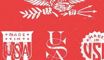 A collection of Made in USA badges on red