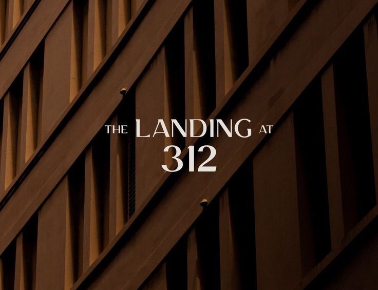 The Landing at 312 heritage serif over dark timber