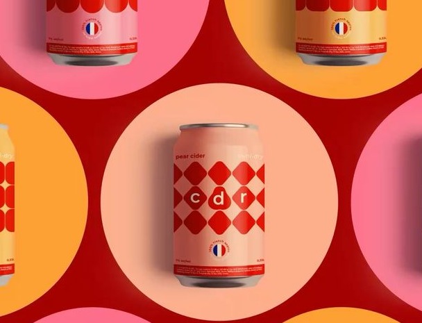 Geometric cider cans on red and pink